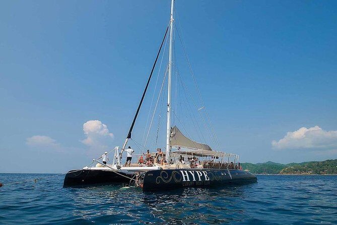 Hype Luxury Catamaran Cruise Experience - Stop 2: Banana Beach on Koh He for Photos and Quick Exploration