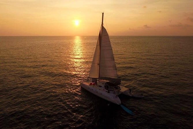 Phuket: Aeolos Catamaran Tour to Coral & Racha Islands + Lunch - Coral Island: reef time, banana beach energy, and jellyfish season reality