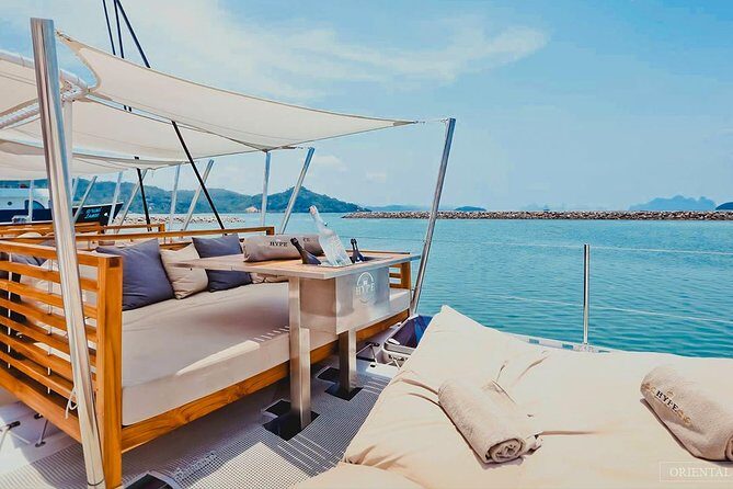 Phuket VIP Hype Luxury Boat Cruise with Party & DJ Vibes - Life On The Hype Luxury Catamaran: Sunbeds, Sound, And Crew Flow